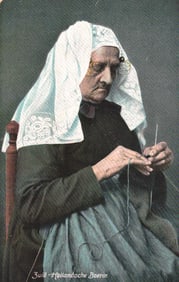 Postcard showing a Zuid-Hollandsche Boerin knitting, wearing traditional Dutch folk costume, c.