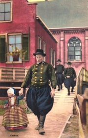 Photochrome postcard of a man & child in traditional Dutch folk dress in Marken, Holland early 1900s