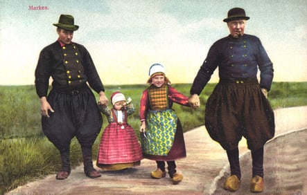 Postcard showing a Dutch family in traditional folk costumes from Marken, Netherlands, early 1900s.