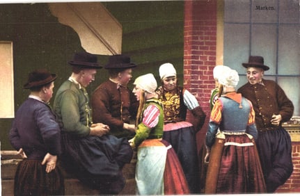 Postcard showing a group of people wearing traditional folk costumes in Marken, Netherlands c.