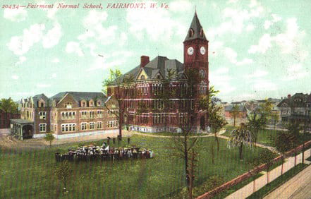 Postcard showing the Fairmont Normal School, a large brick building with a clock tower in Fairmont,