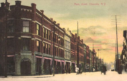 Postcard view of a snowy Main Street in Oneonta, New York with storefronts and carriages, circa 1907