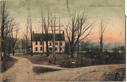 Postcard view of a country house at a fork in the road leading to Oscawana Lake, New York c. 1907.