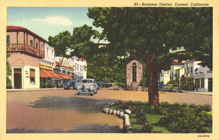 Linen postcard showing the Business District of Carmel, California with classic cars circa 1940s.