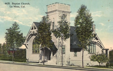 Postcard showing the Baptist Church building on a street corner in La Mesa, California circa 1912.