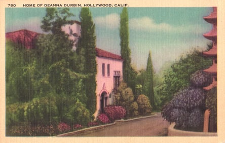 Linen postcard showing the lushly landscaped home of famous actress Deanna Durbin in Hollywood,