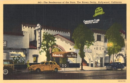 Linen postcard nighttime view of The Brown Derby on Vine Street, a Hollywood, California landmark c.