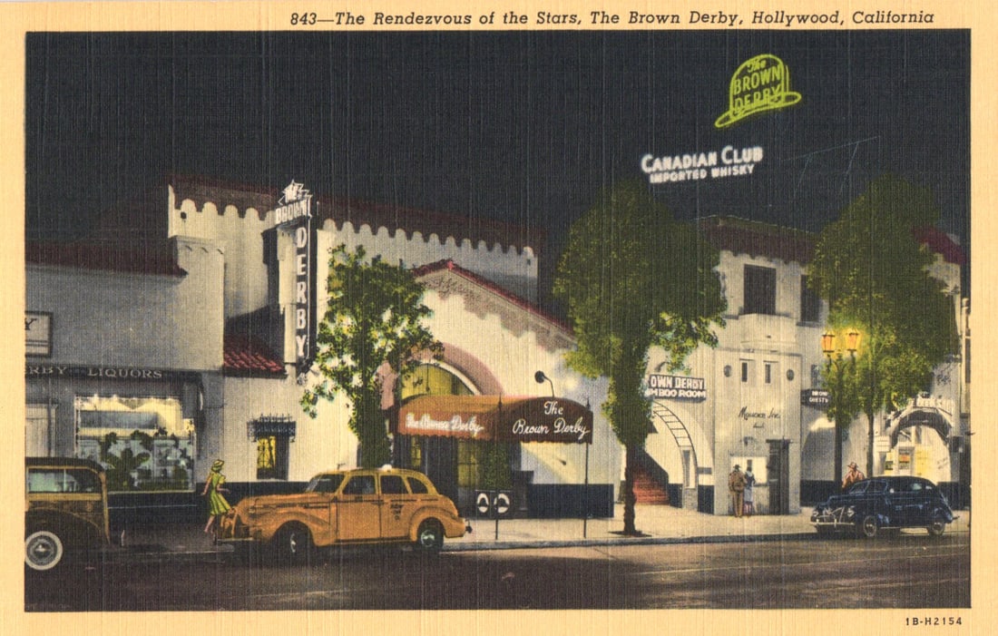 Linen postcard nighttime view of The Brown Derby on Vine Street, a Hollywood, California landmark c. (1 of 2)