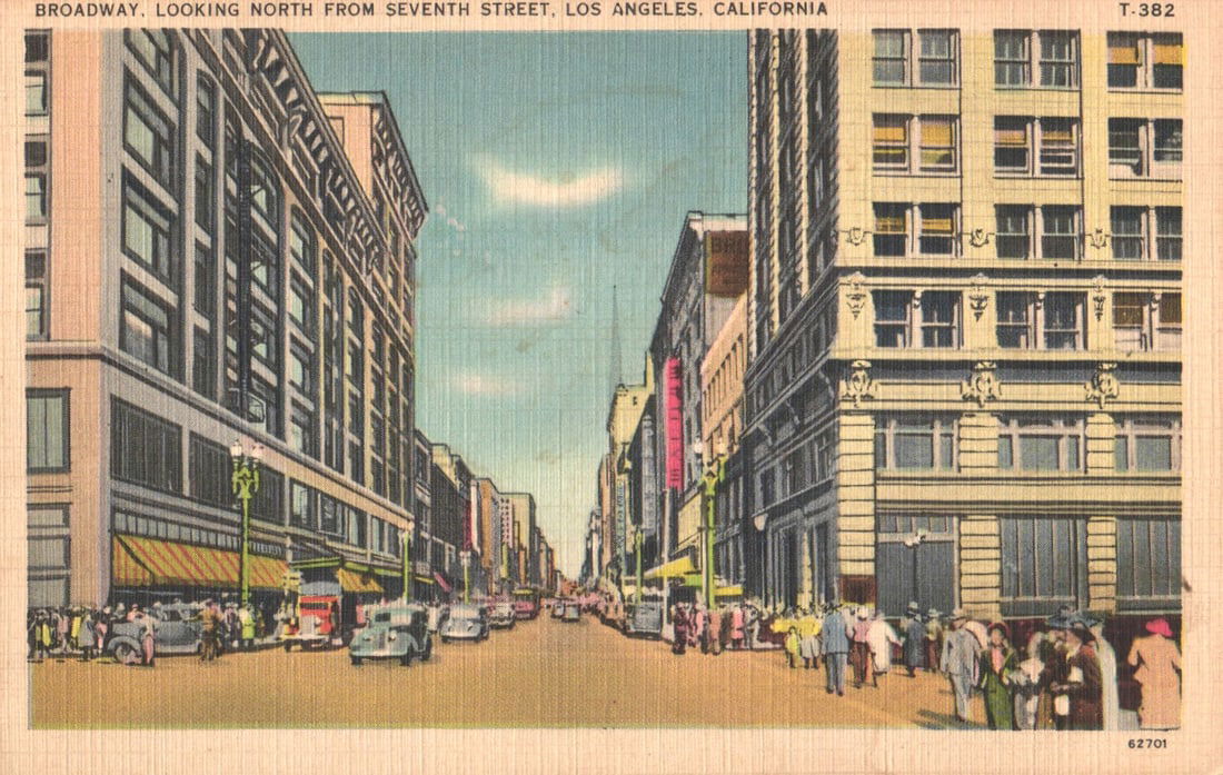Linen Postcard of Broadway looking North from Seventh Street in Los Angeles, California c. 1938: You are bidding on an original postcard and not a reprint. Please view photos for further description and condition considerations. Please know the scans may be darker or lighter than the actual item'