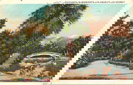Postcard view of Echo Park in midwinter, Los Angeles, California showing the lake and bridge.