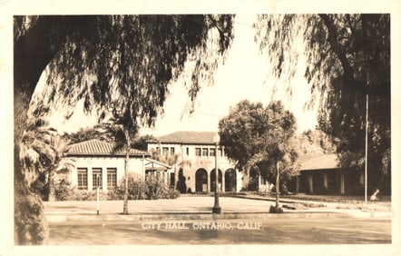 RPPC Real Photo Postcard showing the City Hall building in Ontario, California, street view c. 1940s