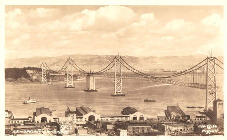 RPPC Real Photo Postcard view of the San Francisco-Oakland Bay Bridge spanning the bay, California.