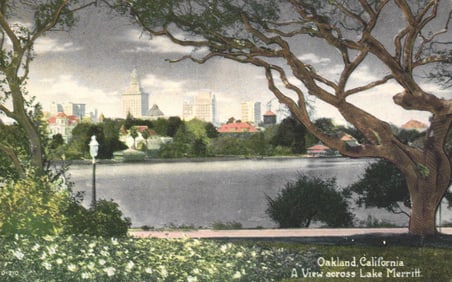 Postcard showing a scenic view across Lake Merritt toward the city skyline in Oakland, California