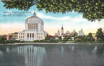 Postcard view of the Alameda County Court House and its reflection in Lake Merritt, Oakland,