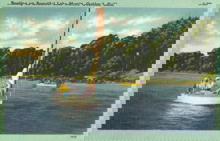 Linen postcard showing people sailing on a sunny day on Lake Merritt in Oakland, California c. 1940s