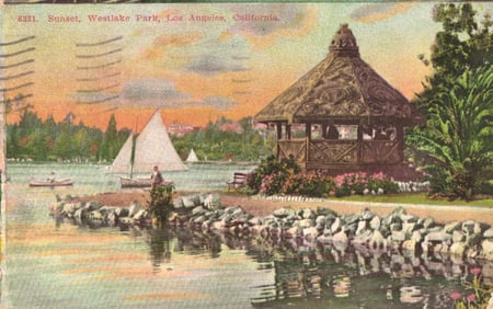 Postcard showing a sunset view of Westlake Park lake with a gazebo and sailboat, Los Angeles,