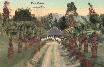 Postcard of Palm Drive in Ontario, California, showing a residence with an early automobile c. 1910s