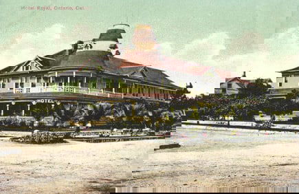 Postcard showing the Queen Anne style Hotel Royal with wrap-around porch in Ontario, California