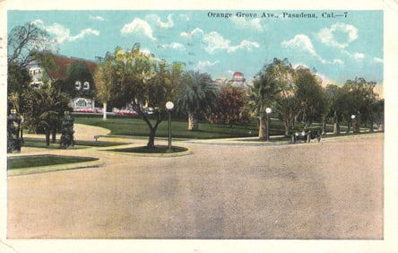 Postcard view of Orange Grove Ave. in Pasadena, California showing trees and early automobile c.