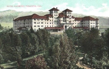 Postcard view of the magnificent Hotel Raymond set against the mountains in Pasadena, California