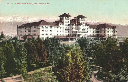 Postcard showing the magnificent Hotel Raymond in Pasadena, California with snowy mountains behind.