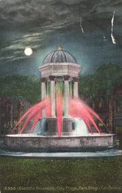 Postcard showing the Electric Fountain with colored lights at night in City Plaza, San Diego,