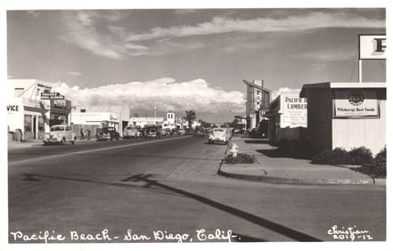 RPPC Real Photo Postcard of a street scene with classic cars in Pacific Beach, San Diego, California