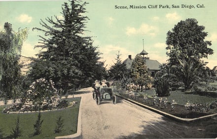 Postcard of an early automobile driving through Mission Cliff Park in San Diego, California c. 1915.