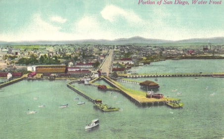 Postcard showing an elevated view of the San Diego, California waterfront with piers circa 1910s.