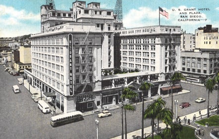 Postcard showing a street view of the U.S. Grant Hotel and Plaza in downtown San Diego, California