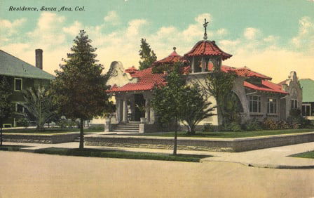 Postcard of a Mission Revival style residence with a distinctive red tile roof in Santa Ana,