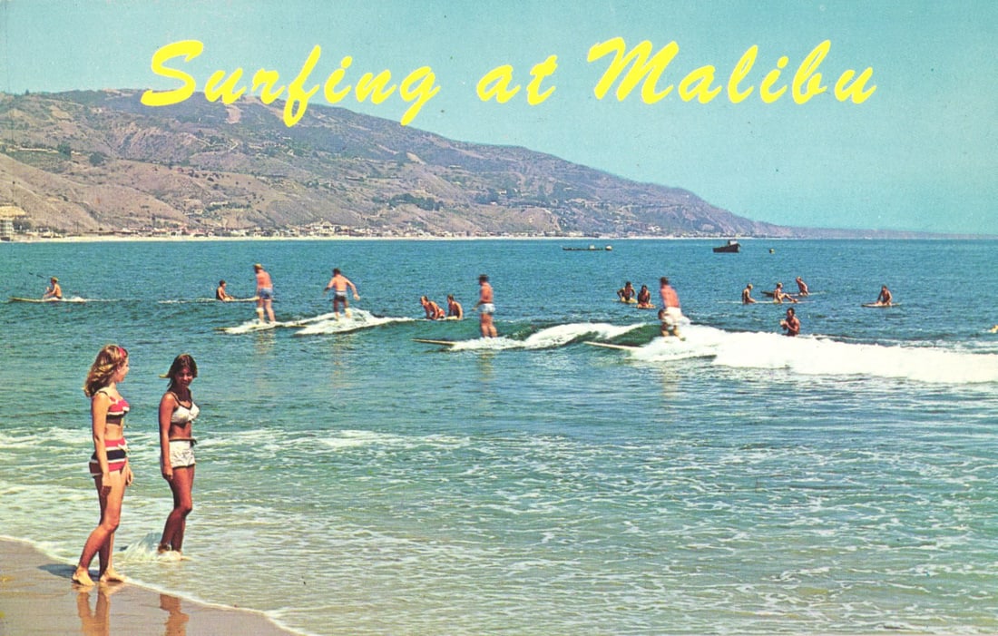 Chrome postcard of surfers riding waves on a sunny day at the famous Malibu Beach, California (1 of 2)
