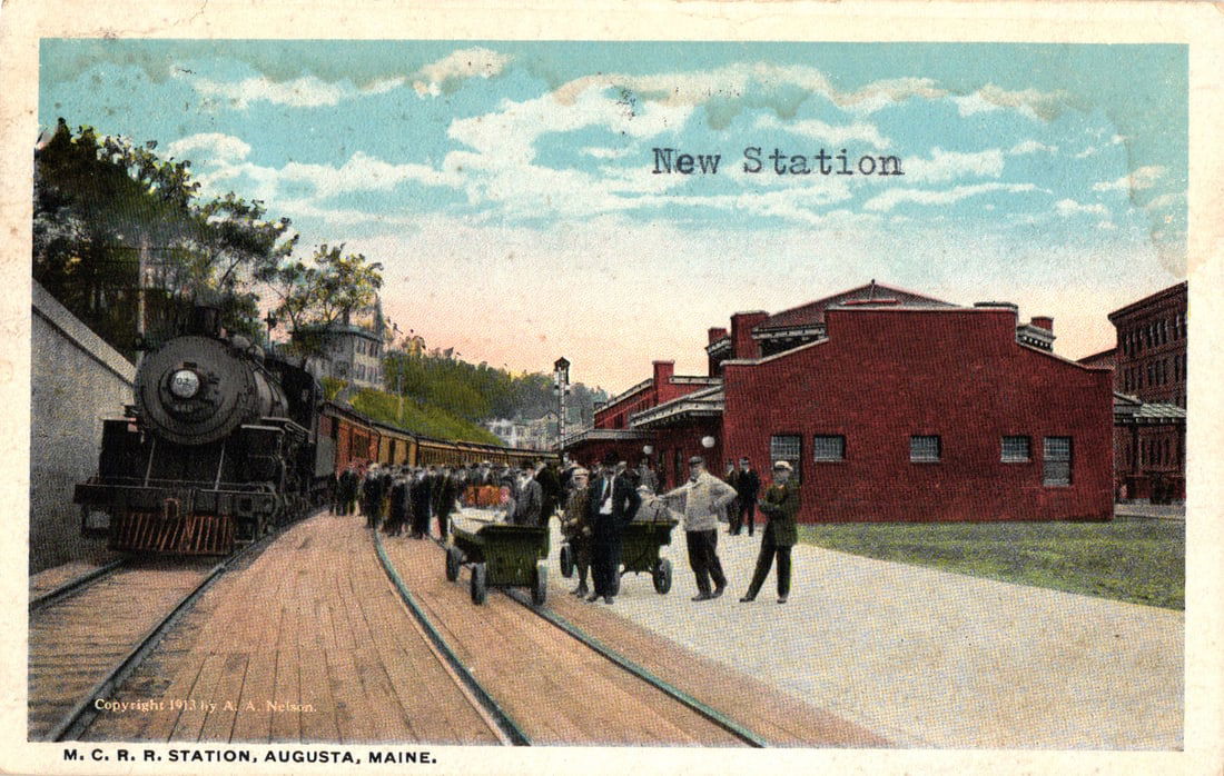 Postcard of the New Maine Central Railroad Station in Augusta, Maine with steam train circa 1913: Please view photos for further description and condition considerations. Please know the scans may be darker or lighter than the actual item's true appearance. ACME Auctions offers FREE DOMESTIC SHIPP