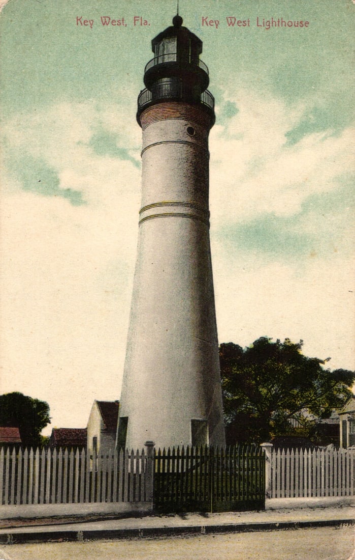 Postcard showing the historic Key West Lighthouse in Key West, Florida, with a picket fence view (1 of 2)