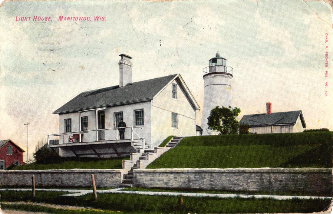 Early 1910s postcard of the Light House and keeper's dwelling on a grassy hill in Manitowoc, (1 of 2)