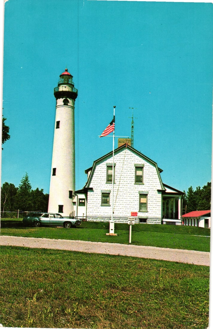 Postcard of the Presque Isle Lighthouse and keeper's house on Lake Huron near Rogers City, Michigan. (1 of 2)