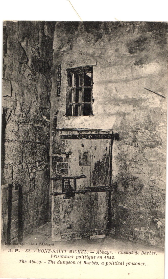 Postcard of the dungeon of Barbès, a political prisoner in 1842, at the Abbey of Mont-Saint-Michel: Please view photos for further description and condition considerations. Please know the scans may be darker or lighter than the actual item's true appearance. ACME Auctions offers FREE DOMESTIC SHIPP