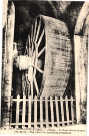 Postcard of the historic hoist wheel (La Roue Monte-charge) at Mont-Saint-Michel Abbey, France.