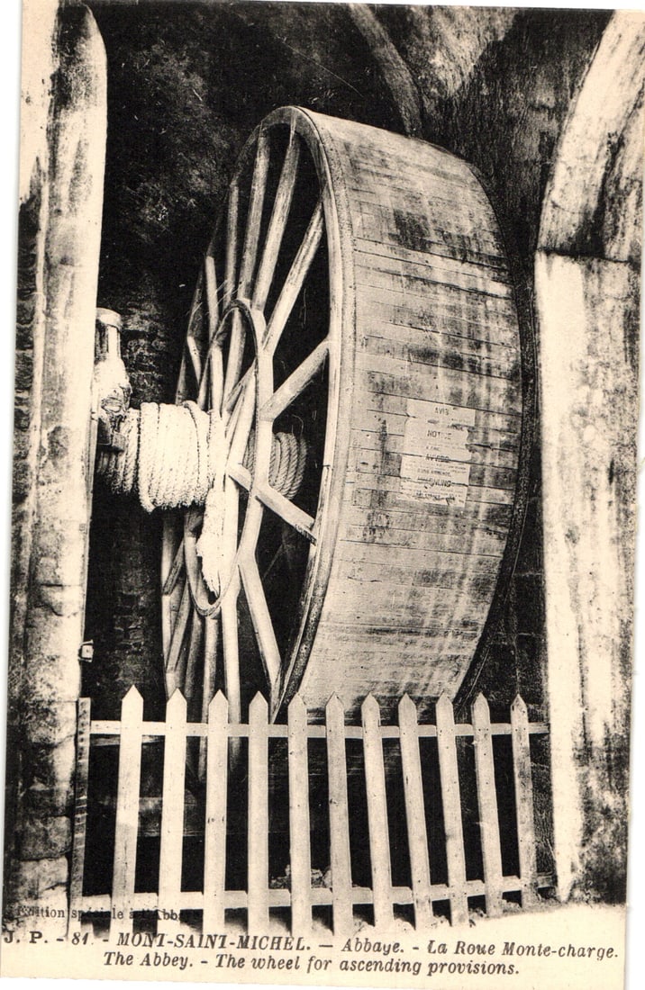 Postcard of the historic hoist wheel (La Roue Monte-charge) at Mont-Saint-Michel Abbey, France.: Please view photos for further description and condition considerations. Please know the scans may be darker or lighter than the actual item's true appearance. ACME Auctions offers FREE DOMESTIC SHIPP