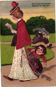 Humorous comic postcard of a mischievous boy's prank on an Edwardian woman walking her dog c.1909.