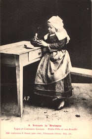 Postcard showing a young girl in traditional costume with her bowl, from Brittany, France, c. 1900s.