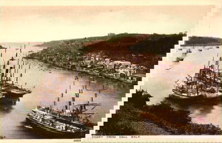 Postcard of the busy Fowey Harbour in Cornwall, England from Hall Walk with sailing ships, c.1910.