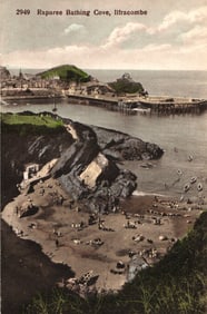 Postcard showing a scenic view of Raparee Bathing Cove in Ilfracombe, England with people on beach.