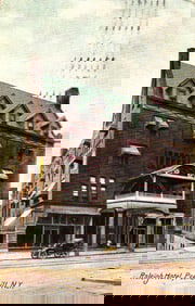 Postcard showing the Raleigh Hotel in Peekskill, New York with early automobile, postmarked 1907.