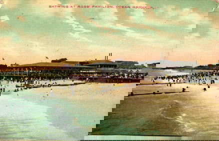 Postcard view of the crowded beach and bathers at Ross' Pavilion, Ocean Grove, New Jersey c. 1910