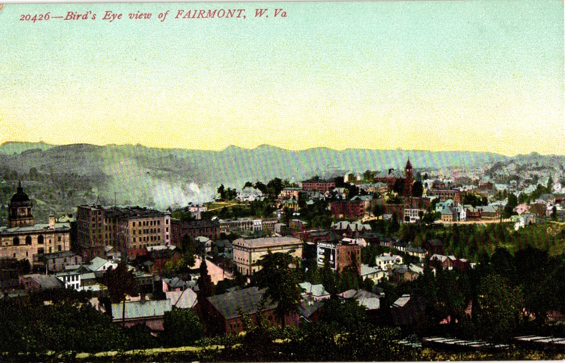 Postcard showing a bird's eye view of the city of Fairmont, West Virginia from an overlook, c. 1910s: Please view photos for further description and condition considerations. Please know the scans may be darker or lighter than the actual item's true appearance. ACME Auctions offers FREE DOMESTIC SHIPP