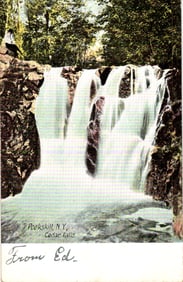 Postcard showing the scenic Cedar Falls in Peekskill, New York. A person watches from the rocks