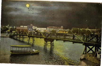 Postcard capturing a moonlight scene over Wesley Lake and bridge in Ocean Grove, New Jersey, c. 1910