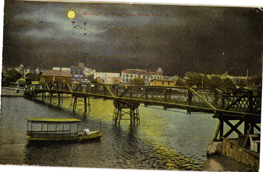 Postcard capturing a moonlight scene over Wesley Lake and bridge in Ocean Grove, New Jersey, c. 1910: Please view photos for further description and condition considerations. Please know the scans may be darker or lighter than the actual item's true appearance. ACME Auctions offers FREE DOMESTIC SHIPP