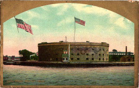 Postcard showing Castle William on Governors Island, New York with American flags flying, circa
